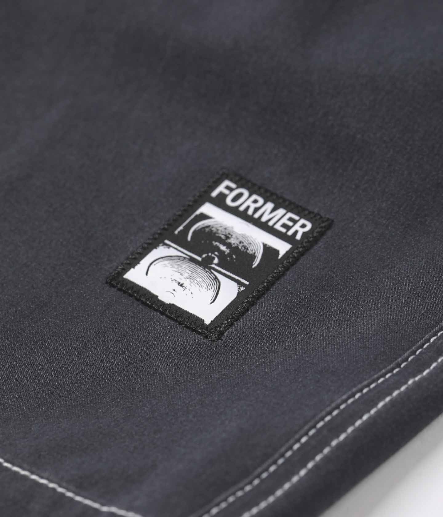 FORMER SWANS BAGGY 18” SWIM TRUNK - BLACK