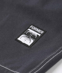 FORMER SWANS BAGGY 18” SWIM TRUNK - BLACK